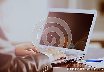 Working on laptop, close up of hands of business man. Stock Photo