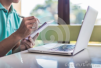 working on laptop, close up of hands of business man Stock Photo