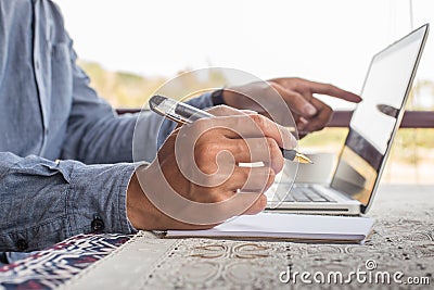 working on laptop, close up of hands of business man. Stock Photo