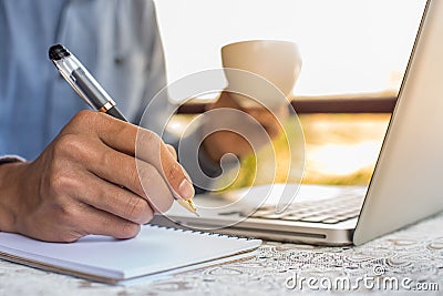 working on laptop, close up of hands of business man. Stock Photo