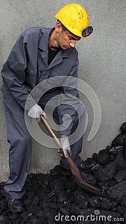 Working with loading coal miner Stock Photo