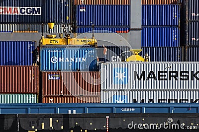 Working men in container terminal Nijmegen Editorial Stock Photo