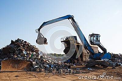 Working metal scrap loading machine Stock Photo