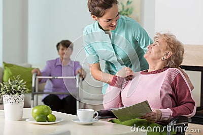 Working in old people's home Stock Photo