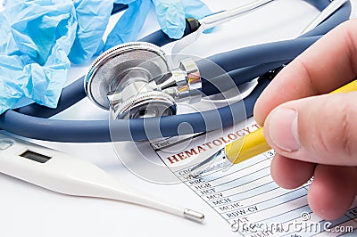 Working scene of general practitioner or pediatrician. Doctor checks patient`s blood analysis. Concept of diagnosis of inflammator Stock Photo