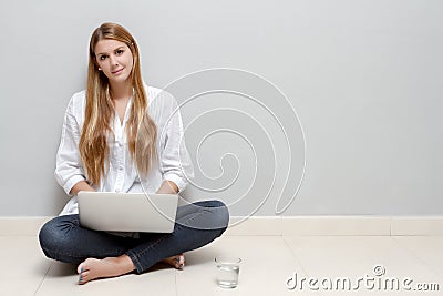 Working sitting on floor Stock Photo