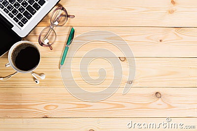 Working space. Laptop, notepad on wooden desk Stock Photo