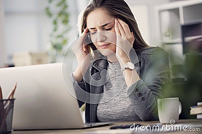 Working woman have a headache Stock Photo