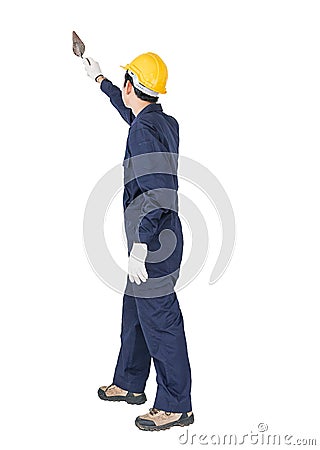 Workman with blue coveralls and hardhat in a uniform holding ste Stock Photo