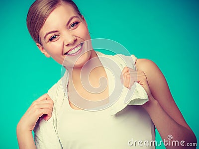 Woman with a towel around her shoulders smiling Stock Photo