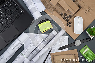 Workplace of architect - notebook, calculator, construction drawings Stock Photo