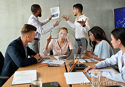 Workplace Conflicts. Stressed Group Of Business People Having Disagreements During Corporate Meeting Stock Photo