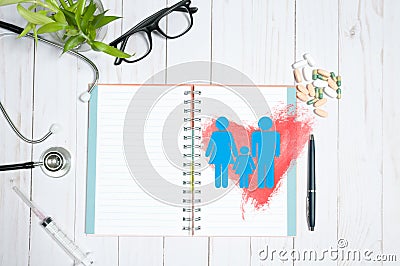 Workplace of doctor - stethoscope, notebook and medical items Stock Photo