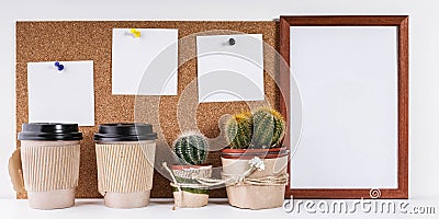 Workplace Mockup. Scandinavian style banner. Three white stickers, empty vertical frame, two cups of coffee, two cactus on a white Stock Photo