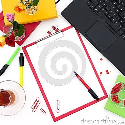 Workplace in office or home with computer, notebook, supplies, cup of tee and roses flowers. Space for modern creative work of Editorial Stock Photo