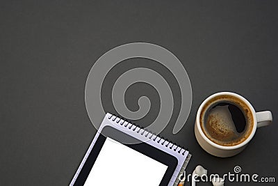 Workplace. Phone, tablet and notepad on the table. Template for desigh with copy space. Business, education concept Stock Photo