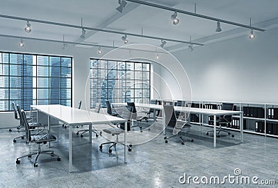 Workplaces in a bright modern loft open space office. Empty tables and docents' book shelves. Singapore panoramic view. A concept Stock Photo