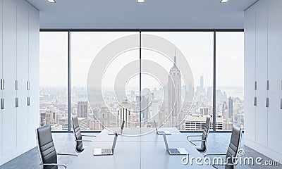 Workplaces or conference area in a bright modern open space office. Stock Photo