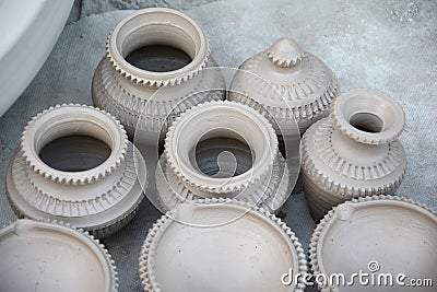 Works on traditional diya oil lamps in Bikaner, India. Stock Photo