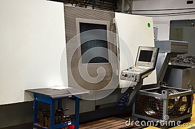 Workshop of a factory with automatic CNC turning machines. High precision computerized CNC plasma cutter. Stock Photo