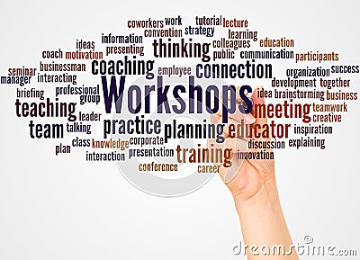 Workshops word cloud and hand with marker concept Stock Photo