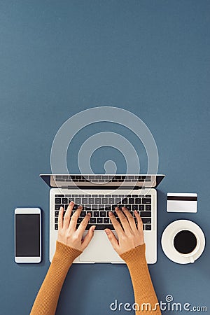 Shopping and online payment by using notebook. Female hand working on modern laptop Stock Photo