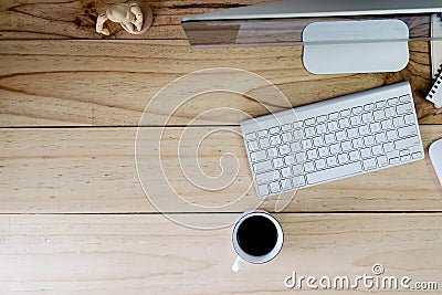 Workspace modern desktop computer on wood table and office stuff. Stock Photo