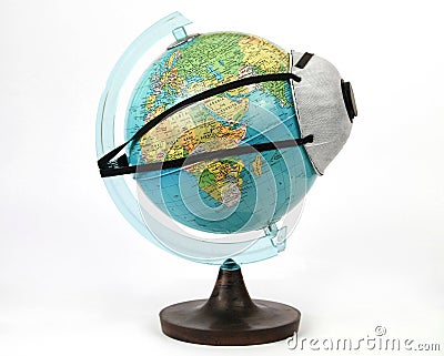 World ball with filter mask against coronavirus Stock Photo