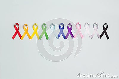 World cancer day concept, February 4. Colorful awareness ribbons on blue background Stock Photo