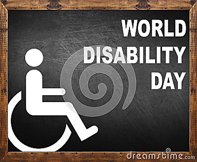 World disability day written on blackboard Stock Photo