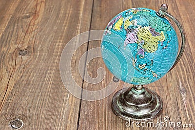 World Geographical Globe On The Wooden Table Stock Photo