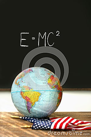 World globe,American flag on school desk Stock Photo