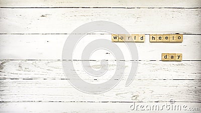 World greetings day.World Hello Day. wooden cubes with letters Stock Photo