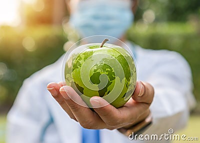 World health day an apple a day keeps the doctor away concept for health benefit by eating high nutritious clean food Stock Photo