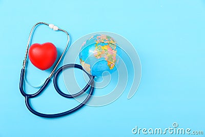 World health day concept, Stethoscope, globe and red heart Stock Photo