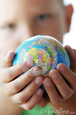 The world in kids hands Stock Photo