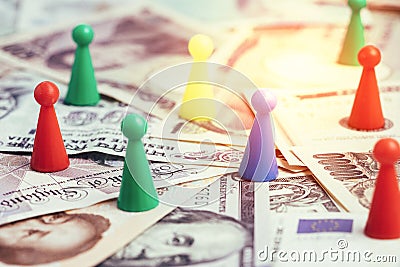 World money tariff trade war, colorful plastic game figurines on Stock Photo