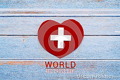 World Red Cross day. Red heart on wooden table background texture Editorial Stock Photo