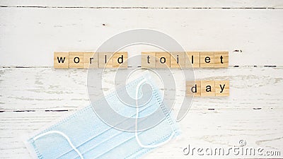 World Toilet Day.words from wooden cubes with letters photo Stock Photo