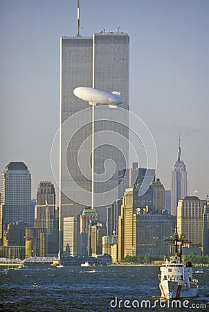 World Trade Towers with Good Year Blimp in foreground, New York City, NY Editorial Stock Photo