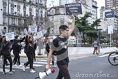 2021 World Vegan Day, Argentina. Man leading a group marching for animal rights Editorial Stock Photo