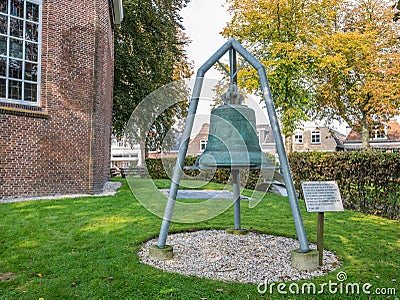 World War II memorial of church bell renamed as emergency bell in Akkrum, Friesland, Netherlands Stock Photo