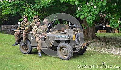 World War 2 Jeep with men dressed as World War 2 American Soldiers. Editorial Stock Photo