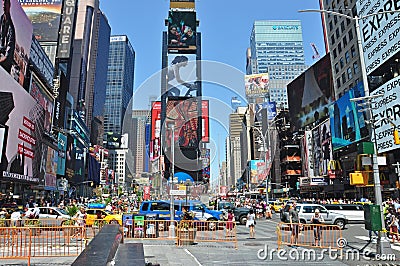 The worlds famous Times Square in New York City day time Editorial Stock Photo