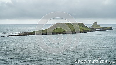 The Worms Head, coastal landmark in South Wales UK Stock Photo