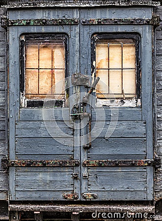 Worn abandoned railway carriage door Stock Photo
