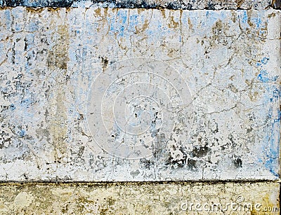 Worn blue paint texture in old stone wall. Stock Photo