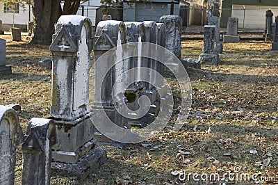 Worn headstones in old graveyard Stock Photo