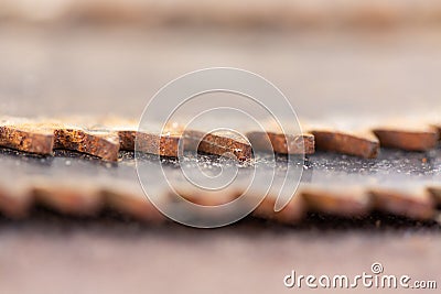 Worn out rusty circular saw blades, macro abstract defocused background, copy space, teeth detail Stock Photo