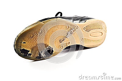 Worn out Sports Shoe with hole Stock Photo